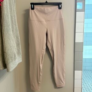 Lululemon leggings in cream color